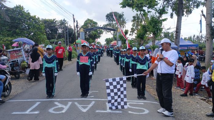 Lomba Gerak Jalan di Desa Sumberasri: Sarana Meningkatkan Persatuan dan Nasionalisme