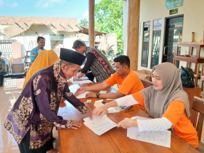 Pemdes Desa Benelanlor Bersama Bank BNI Bagikan Rekening Bantuan PKH